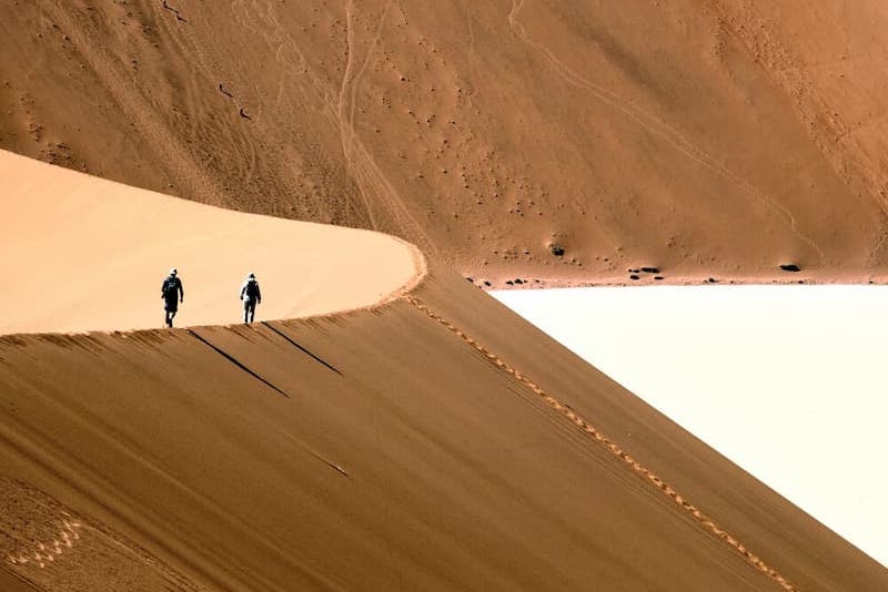 Walking atop sand dunes, Sossusvlei